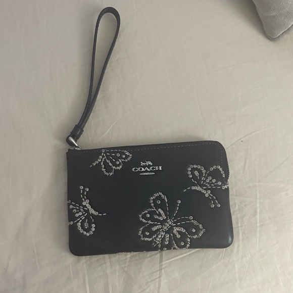 Coach Handbags - Coach Black Wristlet with Floral Embroidery